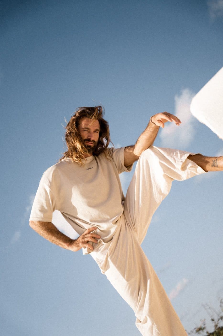 Man moving confidently outdoors, illustrating the embodied confidence of backing up a boundary